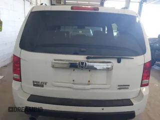 2010 Honda Pilot Touring with VIN 5FNYF4H95AB019903, listed as a IAAI auction lot 42196082 with 233,527 mi miles and . Bid and sale history available at carsss.com. Image 16.