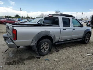 2002 Nissan Frontier XE with VIN 1N6ED29X52C373720, listed as a Copart auction lot 52819505 with Not provided miles and Clean title. Bid and sale history available at DreamBid. Image 3.