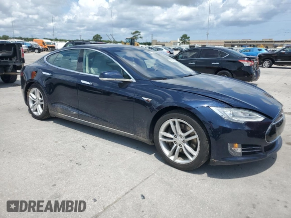 2014 Tesla Model S 60 with VIN 5YJSA1H12EFP61355, listed as a Copart auction lot 59709065 with 109,446 mi miles and Salvage title. Bid and sale history available at DreamBid. Image 4.