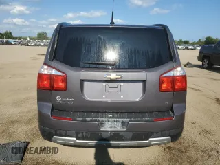 2014 Chevrolet Orlando z VIN KL77P2EK5EK594965, wystawiony jako Copart lot #68862084 z przebiegiem 250 788 mil mil oraz Tytuł czysty. Historia ofert i sprzedaży dostępna na DreamBid. Obrazek 6.