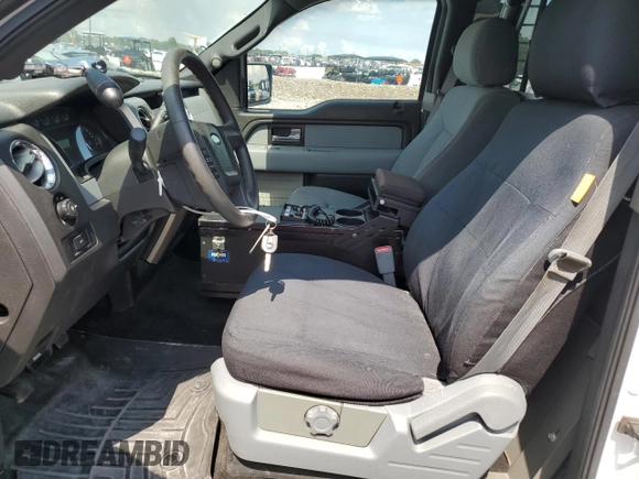 2014 Ford F-150 XL with VIN 1FTFW1CF3EKF39819, listed as a Copart auction lot 62313945 with 75,486 mi miles and Salvage title. Bid and sale history available at DreamBid. Image 7.