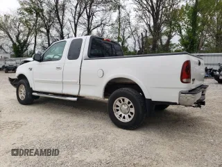 2002 Ford F-150 XL with VIN 1FTRX18L42NB60380, listed as a Copart auction lot 51806955 with 293,591 mi miles and Salvage title. Bid and sale history available at DreamBid. Image 2.