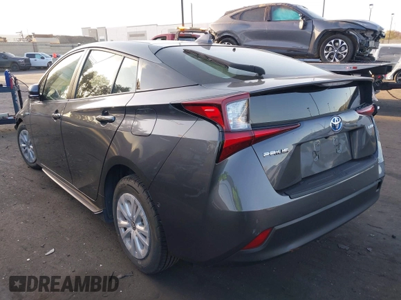 2020 Toyota Prius L Eco z VIN JTDKARFU9L3122010, wystawiony jako IAAI lot #41969655 z przebiegiem 76 250 mil mil oraz . Historia ofert i sprzedaży dostępna na DreamBid. Obrazek 3.