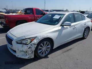 2015 Infiniti Q50 with VIN JN1BV7AP1FM333942, listed as a IAAI auction lot 42310734 with 111,592 mi miles and . Bid and sale history available at DreamBid. Image 2.