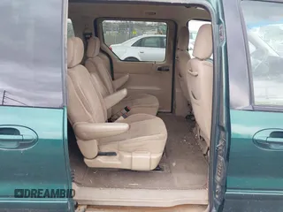 2002 Ford Windstar Sport Standard z VIN 2FMZA57482BB61834, wystawiony jako IAAI lot #41833929 z przebiegiem 209 170 mil mil oraz . Historia ofert i sprzedaży dostępna na DreamBid. Obrazek 8.