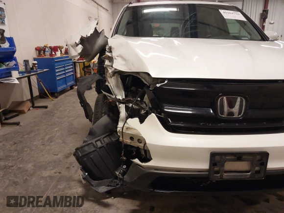 2021 Honda Pilot Special Edition z VIN 5FNYF6H26MB086397, wystawiony jako IAAI lot #41162732 z przebiegiem 94 246 mil mil oraz . Historia ofert i sprzedaży dostępna na DreamBid. Obrazek 6.
