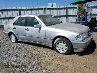 1998 Mercedes-Benz C 230/260/280/320 with VIN WDBHA23G6WA610121, listed as a Copart auction lot 68589184 with 134,147 mi miles and Salvage Title. Bid and sale history available at carsss.com. Image 4.