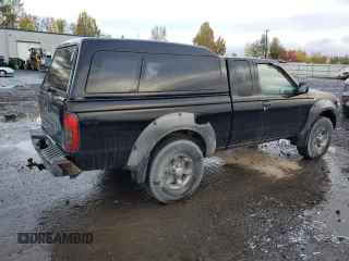 2002 Nissan Frontier XE with VIN 1N6ED26Y52C361595, listed as a Copart auction lot 77796414 with 170,555 mi miles and Salvage title. Bid and sale history available at DreamBid. Image 3.