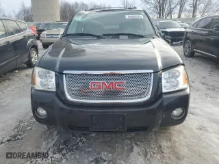 2005 GMC Envoy Denali with VIN 1GKET63M652353972, listed as a Copart auction lot 43690635 with 113,630 mi miles and Clean Title. Bid and sale history available at carsss.com. Image 5.