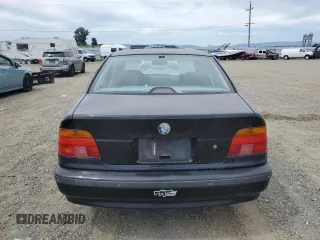 2000 BMW 5 Series z VIN WBADM5341YBY17346, wystawiony jako Copart lot #52618955 z przebiegiem 268 792 mil mil oraz Szkoda całkowita • Salvage title. Historia ofert i sprzedaży dostępna na DreamBid. Obrazek 6.