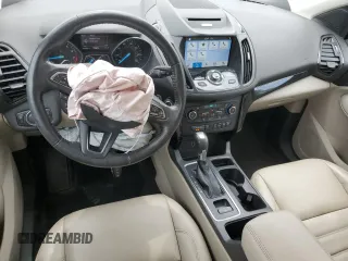 2017 Ford Escape Titanium with VIN 1FMCU0J95HUB96659, listed as a Copart auction lot 54053775 with 69,744 mi miles and Salvage Title. Bid and sale history available at DreamBid. Image 8.