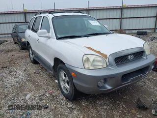 2003 Hyundai Santa Fe LX with VIN KM8SC73E23U536604, listed as a IAAI auction lot 41244086 with 193,213 mi miles. Bid and sale history available at carsss.com. Image 1.