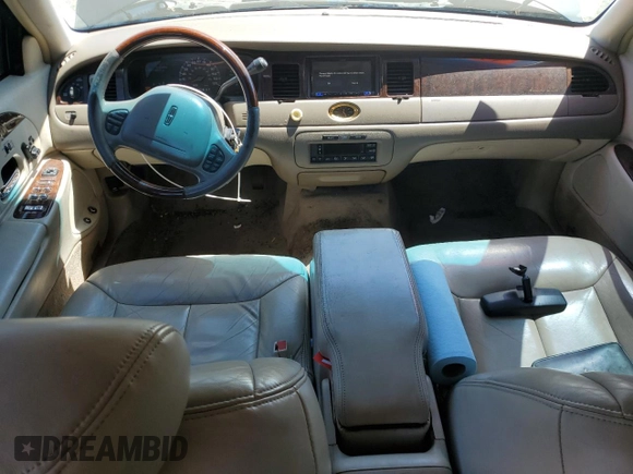 2001 Lincoln Town Car Cartier L z VIN 1LNHM85W71Y624315, wystawiony jako Copart lot #60479385 z przebiegiem 171 485 mil mil oraz Czysty tytuł • Clean title. Historia ofert i sprzedaży dostępna na DreamBid. Obrazek 8.