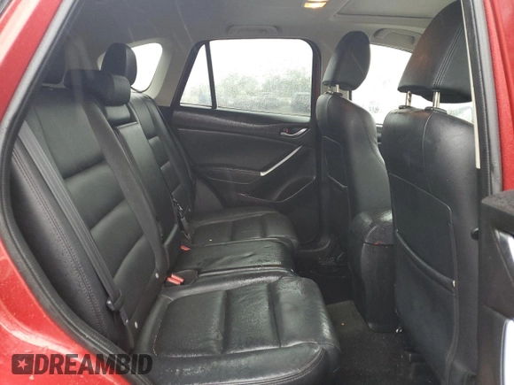 2016 Mazda CX-5 Grand Touring with VIN JM3KE4DY3G0713283, listed as a Copart auction lot 73346194 with 135,382 mi miles and Salvage Title. Bid and sale history available at carsss.com. Image 11.