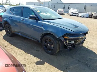 2024 Dodge Hornet R/T Plus with VIN ZACPDFDW1R3A09454, listed as a IAAI auction lot 42102576 with 12,720 mi miles and . Bid and sale history available at DreamBid. Image 1.