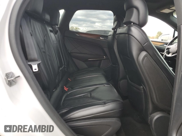 2015 Lincoln MKC z VIN 5LMTJ2AHXFUJ41226, wystawiony jako Copart lot #53430915 z przebiegiem 79 737 mil mil oraz Szkoda całkowita • Salvage title. Historia ofert i sprzedaży dostępna na DreamBid. Obrazek 11.