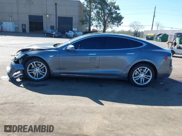 2014 Tesla Model S 60 with VIN 5YJSA1S10EFP32851, listed as a IAAI auction lot 41730746 with 91,657 mi miles and . Bid and sale history available at DreamBid. Image 14.
