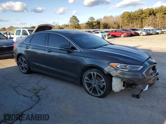 2019 Ford Fusion Titanium with VIN 3FA6P0K98KR271219, listed as a Copart auction lot 47873695 with 121,751 mi miles and Clean Title. Bid and sale history available at carsss.com. Image 4.