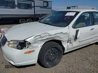 2000 Nissan Maxima GXE with VIN JN1CA31D7YT700656, listed as a IAAI auction lot 42675421 with 94,006 mi miles and . Bid and sale history available at DreamBid. Image 6.