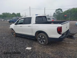 2018 Honda Ridgeline RTL-E with VIN 5FPYK3F77JB017293, listed as a IAAI auction lot 42422614 with 87,700 mi miles and . Bid and sale history available at DreamBid. Image 3.