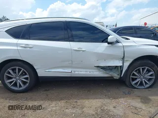 2021 Acura RDX Technology with VIN 5J8TC1H59ML023597, listed as a IAAI auction lot 41938661 with 43,441 mi miles and . Bid and sale history available at DreamBid. Image 13.