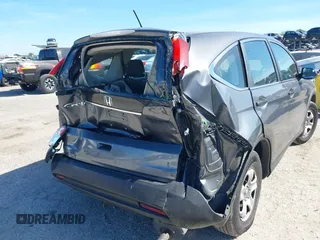 2013 Honda CR-V LX with VIN 3CZRM3H33DG702711, listed as a IAAI auction lot 41889747 with 132,937 mi miles. Bid and sale history available at carsss.com. Image 6.