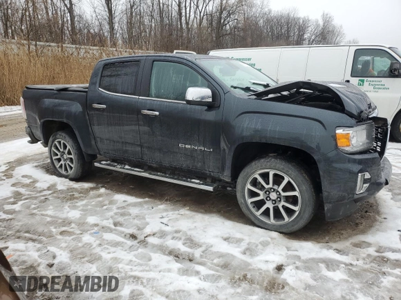 2021 GMC Canyon 4WD Denali with VIN 1GTG6EENXM1199427, listed as a Copart auction lot 86018624 with 98,520 mi miles and Salvage Title. Bid and sale history available at carsss.com. Image 4.