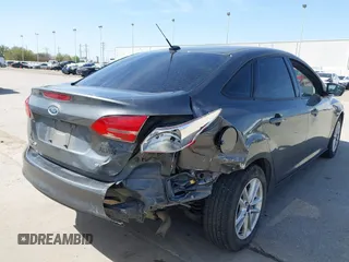 2018 Ford Focus SE with VIN 1FADP3F2XJL302358, listed as a IAAI auction lot 41807622 with 76,145 mi miles. Bid and sale history available at carsss.com. Image 6.