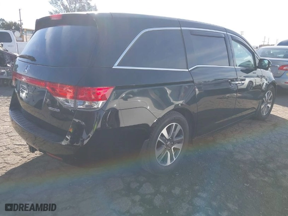 2014 Honda Odyssey Touring with VIN 5FNRL5H92EB078352, listed as a IAAI auction lot 41680386 with NaN miles. Bid and sale history available at carsss.com. Image 4.