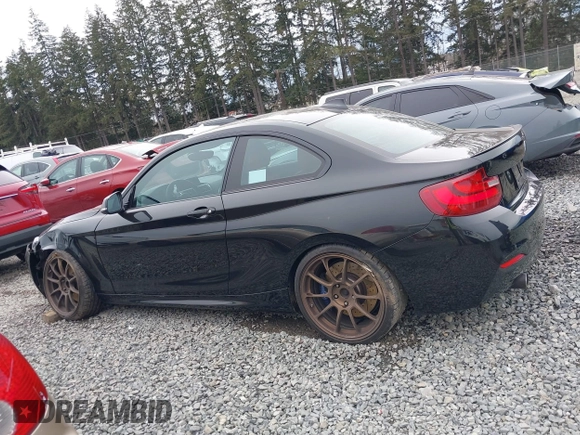 2015 BMW 2 Series M235i with VIN WBA1J7C55FV358527, listed as a IAAI auction lot 41839031 with 81,900 mi miles and . Bid and sale history available at carsss.com. Image 14.