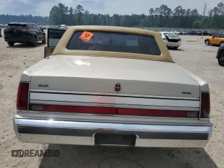 1989 Lincoln Town Car z VIN 1LNBM81F8KY816906, wystawiony jako Copart lot #51316715 z przebiegiem 361 830 mil mil oraz Szkoda całkowita • Salvage title. Historia ofert i sprzedaży dostępna na DreamBid. Obrazek 6.