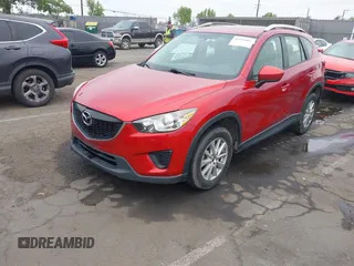 2015 Mazda CX-5 Sport z VIN JM3KE2BE9F0452625, wystawiony jako IAAI lot #42114867 z przebiegiem 167 849 mil mil oraz . Historia ofert i sprzedaży dostępna na DreamBid. Obrazek 19.