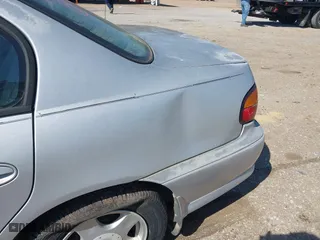 2001 Chevrolet Malibu LS with VIN 1G1NE52J216178803, listed as a IAAI auction lot 41976546 with 119,127 mi miles. Bid and sale history available at carsss.com. Image 15.