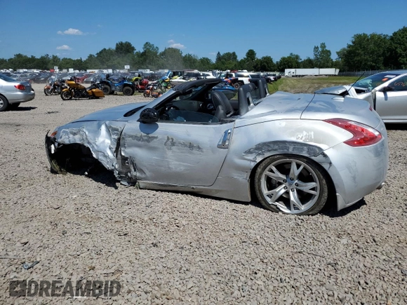 2012 Nissan 370Z Touring with VIN JN1AZ4FH3CM370910, listed as a Copart auction lot 65940005 with 23,009 mi miles and Salvage title. Bid and sale history available at DreamBid. Image 2.