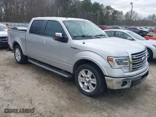 2013 Ford F-150 XL with VIN 1FTFW1CT1DFB14421, listed as a IAAI auction lot 41698573 with 243,033 mi miles. Bid and sale history available at carsss.com. Image 1.