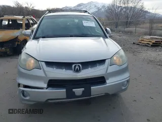 2007 Acura RDX Technology z VIN 5J8TB18587A018409, wystawiony jako IAAI lot #41803759 z przebiegiem 137 073 mil mil oraz . Historia ofert i sprzedaży dostępna na DreamBid. Obrazek 12.