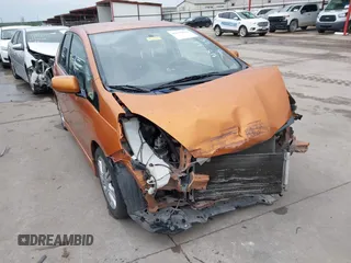 2009 Honda Fit Sport z VIN JHMGE88499S058369, wystawiony jako IAAI lot #42344862 z przebiegiem 118 961 mil mil oraz . Historia ofert i sprzedaży dostępna na DreamBid. Obrazek 1.