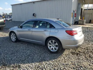 2013 Chrysler 200 LX with VIN 1C3CCBAB8DN660221, listed as a Copart auction lot 87164134 with 111,220 mi miles and Salvage Title. Bid and sale history available at carsss.com. Image 2.