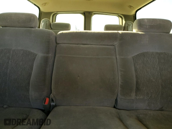 2000 Chevrolet Suburban LS with VIN 3GNEC16T6YG141156, listed as a Copart auction lot 75569064 with 246,247 mi miles and Salvage title. Bid and sale history available at DreamBid. Image 10.