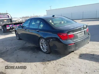 2015 BMW 7 Series 750Li xDrive with VIN WBAYF8C53FD655386, listed as a IAAI auction lot 41474678 with 122,160 mi miles and . Bid and sale history available at carsss.com. Image 3.