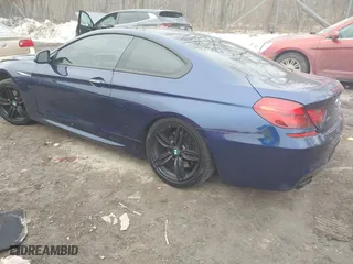 2016 BMW 6 Series 650i xDrive with VIN WBA6H7C5XGGA05033, listed as a IAAI auction lot 41723869 with 132,227 mi miles. Bid and sale history available at carsss.com. Image 3.