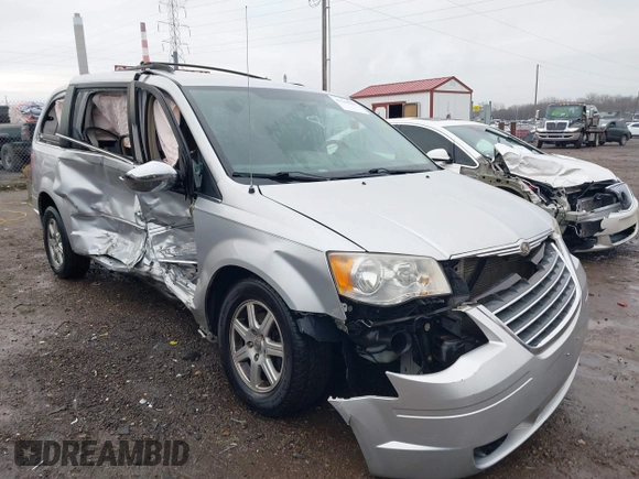 2010 Chrysler Town & Country Touring with VIN 2A4RR5D14AR293299, listed as a IAAI auction lot 41184584 with 245,928 mi miles. Bid and sale history available at carsss.com. Image 1.