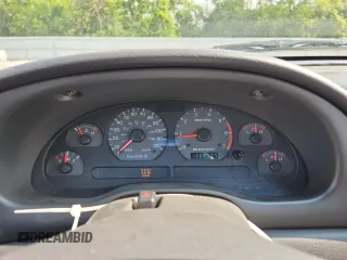 1999 Ford Mustang z VIN 1FAFP4043XF155493, wystawiony jako Copart lot #62666095 z przebiegiem 126 807 mil mil oraz Nie do naprawy • Non repairable. Historia ofert i sprzedaży dostępna na DreamBid. Obrazek 9.