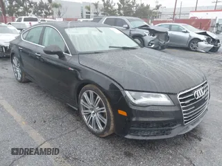 2014 Audi A7 3.0 Prestige with VIN WAU2GAFC5EN090233, listed as a IAAI auction lot 41565942 with 199,890 mi miles. Bid and sale history available at carsss.com. Image 1.