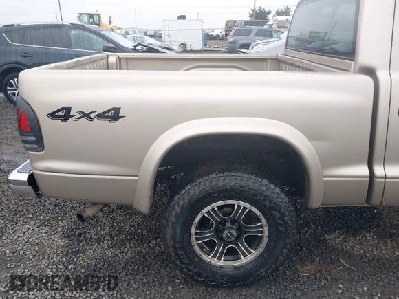 2004 Dodge Dakota SLT с VIN 1D7HG48NX4S596370, выставлен на аукционе IAAI как лот 41760565 с пробегом 232 409 миль миль и . История ставок и продаж доступна на DreamBid. Изображение 6.