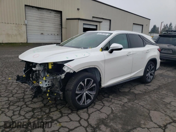 2020 Lexus RX 350L with VIN JTJHZKEA6L2014576, listed as a Copart auction lot 82706154 with 59,775 mi miles and Salvage title. Bid and sale history available at DreamBid. Image 1.