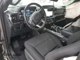 2023 Ford F-150 XL with VIN 1FTFW1E86PFA65505, listed as a Copart auction lot 60644385 with 6,959 mi miles and Salvage title. Bid and sale history available at DreamBid. Image 8.