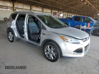 2015 Ford Escape Titanium with VIN 1FMCU9J96FUB33670, listed as a Copart auction lot 61826915 with 179,794 mi miles and Salvage title. Bid and sale history available at DreamBid. Image 4.