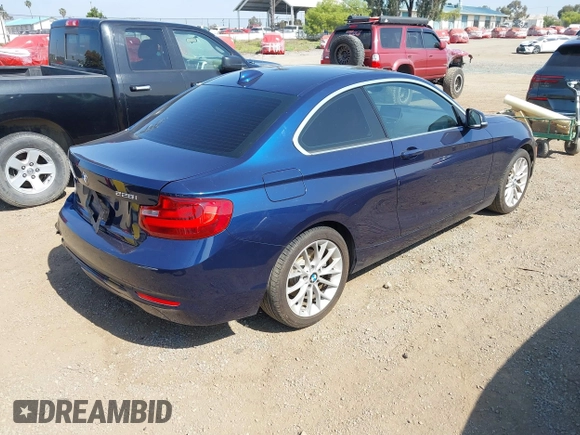 2015 BMW 2 Series 228i with VIN WBA1F9C59FVW98387, listed as a IAAI auction lot 42518807 with 79,848 mi miles and . Bid and sale history available at DreamBid. Image 4.