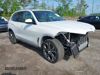 2020 BMW X5 sDrive40i with VIN 5UXCR4C09L9B91649, listed as a IAAI auction lot 41894022 with 65,691 mi miles and . Bid and sale history available at DreamBid. Image 1.